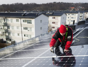 Man constructing solar panels