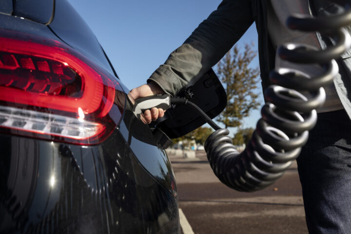 Electric car being charged