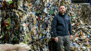 Max Rosenberg in front of shredded waste