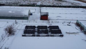 Solar panels in snowy landscape