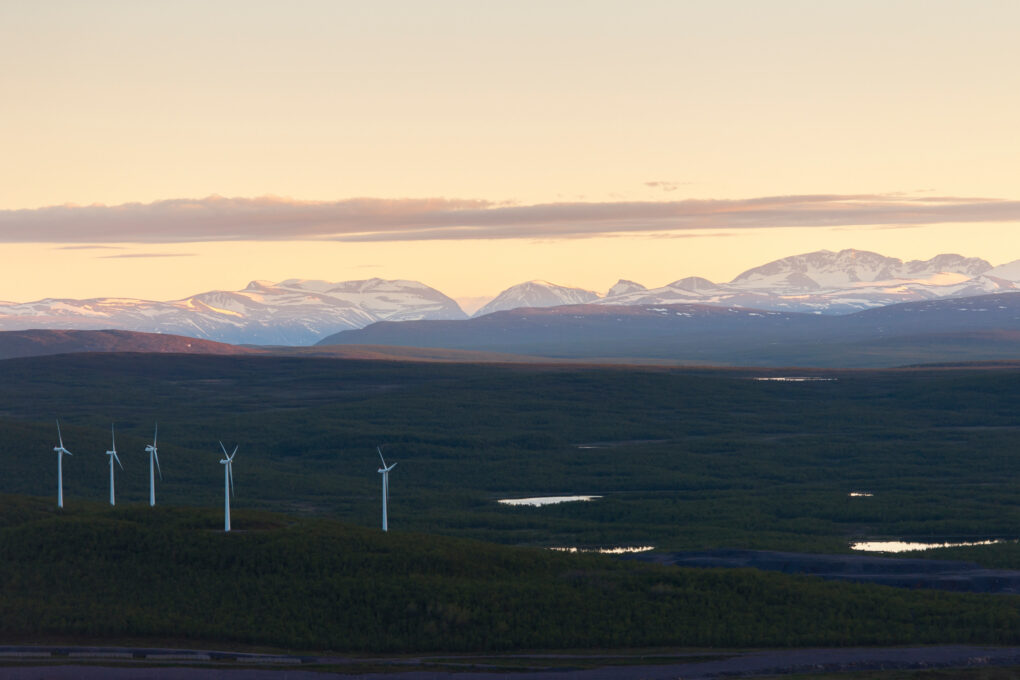 Wind turbines in an open field