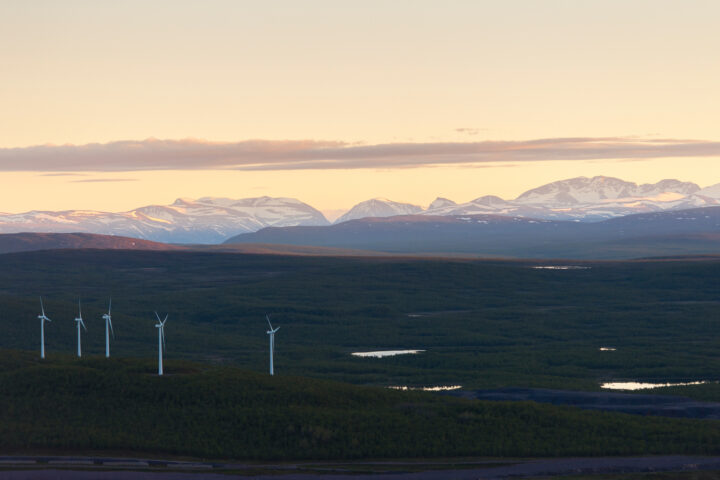 Wind turbines in an open field